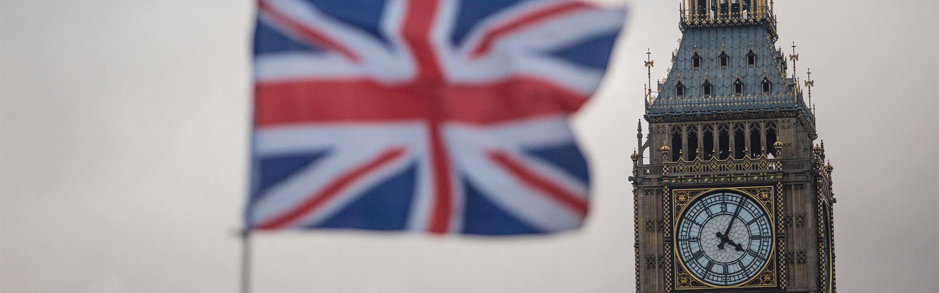 UK flag waving infront of Big Ben