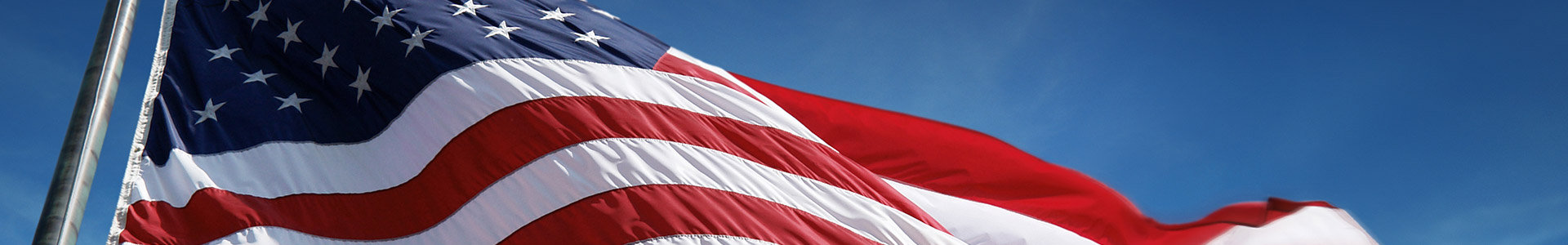 American flag flying infront of the Whitehouse