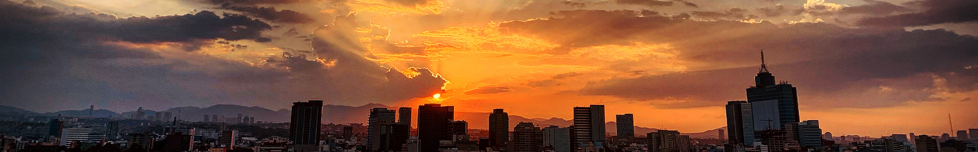 Sun setting over a city