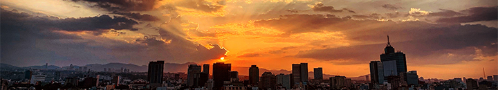 Sun setting over a city