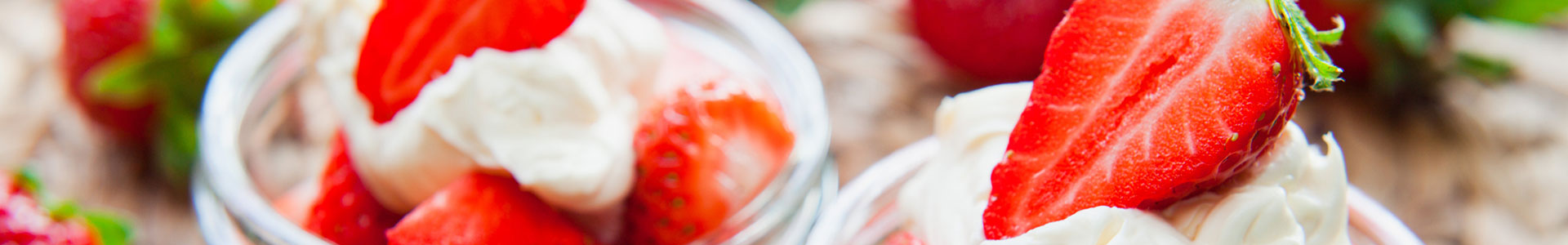 Strawberries and cream in a bowl