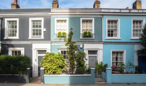 The fronts of different coloured British terrace houses