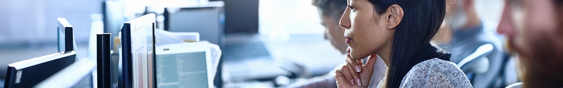 Woman looking at a computer screen