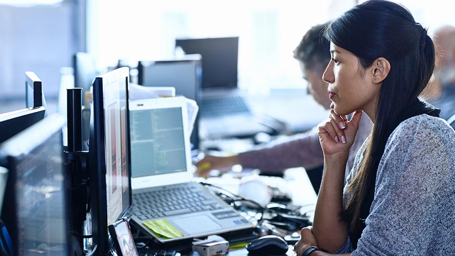 Woman looking at a computer screen