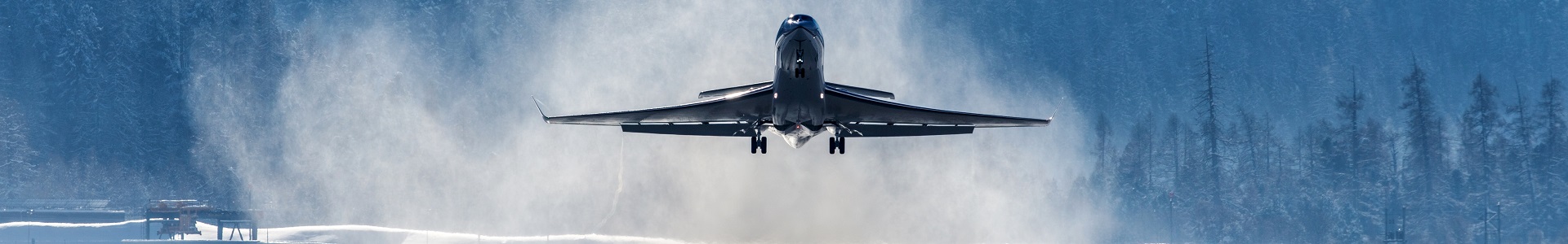 Luxury assets in the UK, plane taking off from runway.
