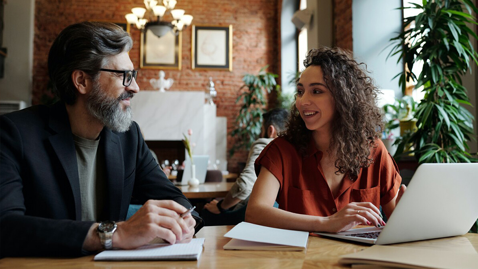 Business people working in coffee shop