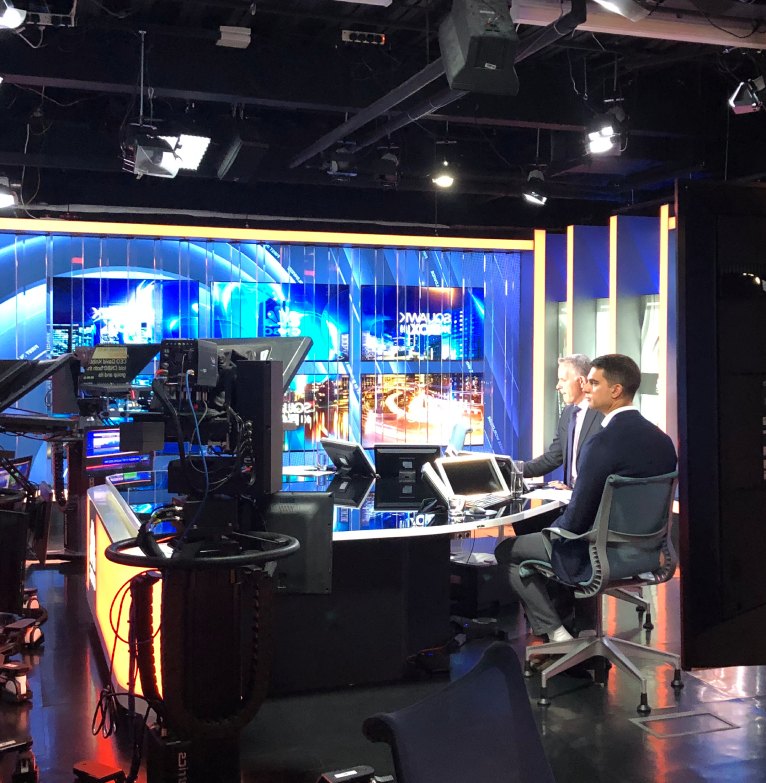 An Investec analyst readies themselves to speak in a television studio