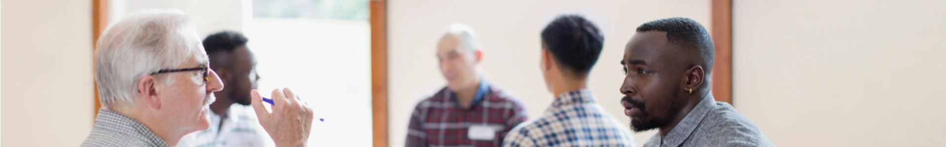 Group therapy happening at a local community hall
