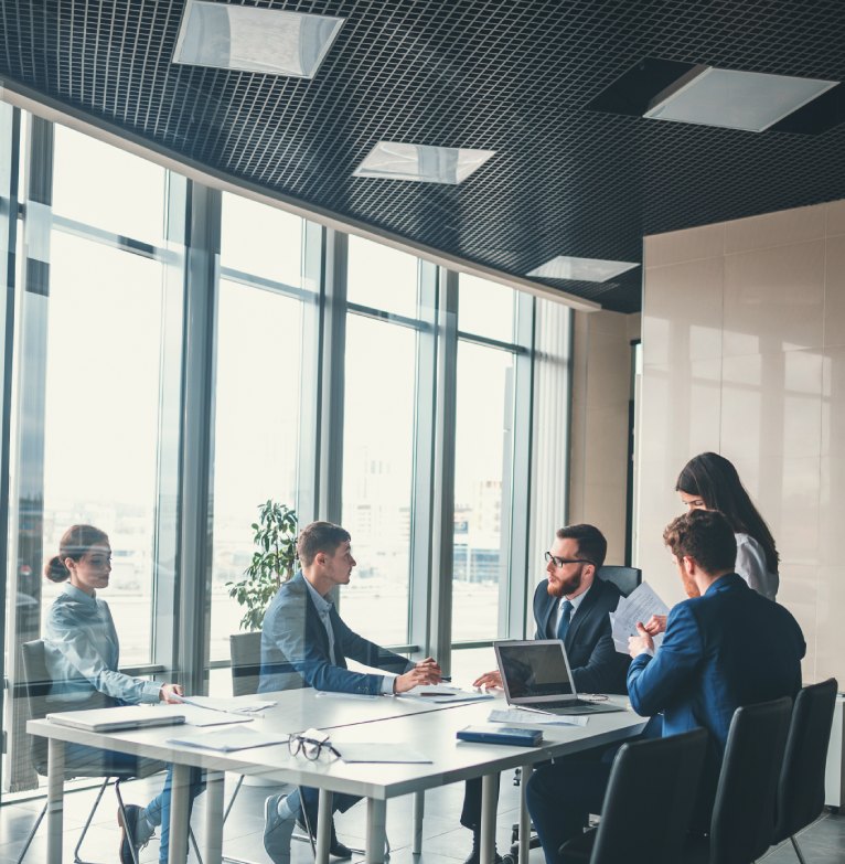 A team of financial advisers talks through a Centralised Investment Proposition