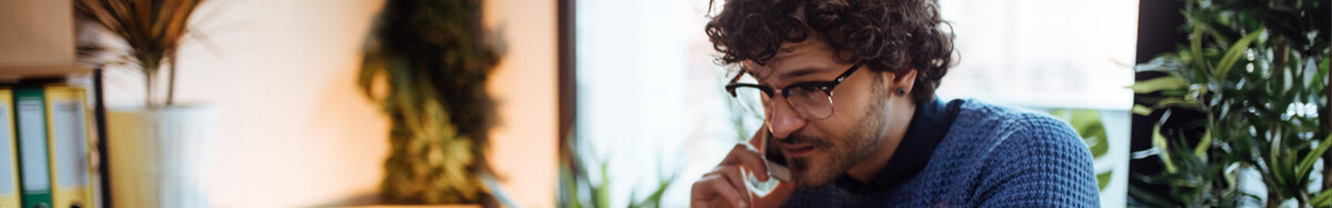 Client on the phone with a Financial Advisor