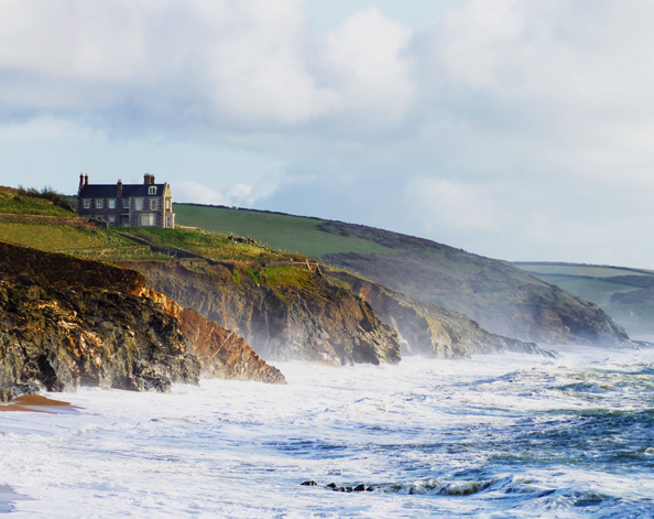 Waves crashing into land