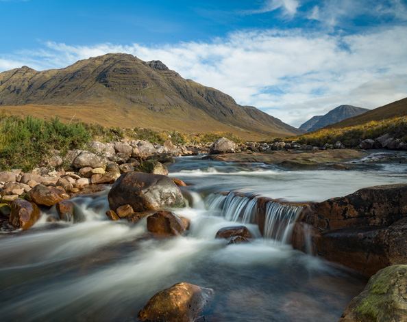 Stream running through countryside