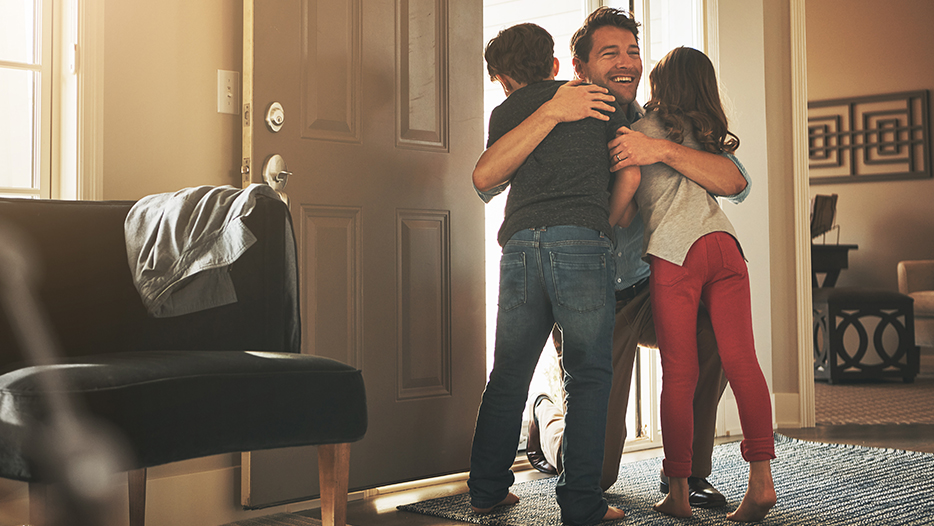 Businessman welcomed home by children