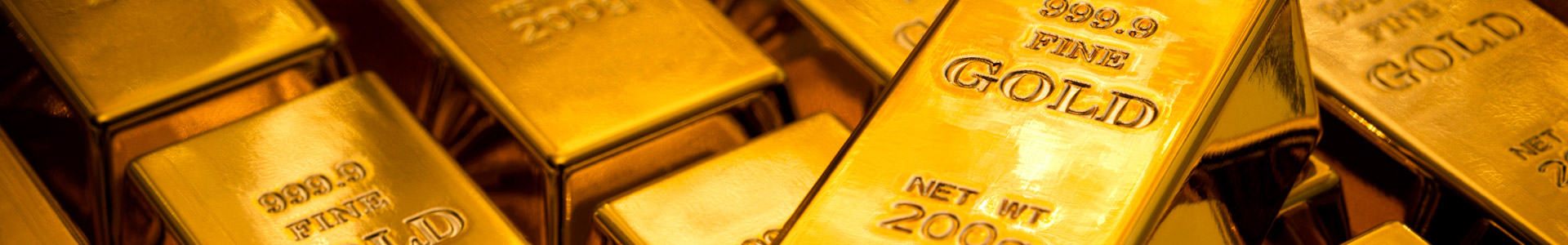 Gold bars stacked in a row