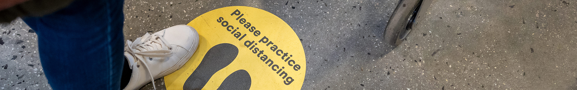 Social distancing sign on shop floor