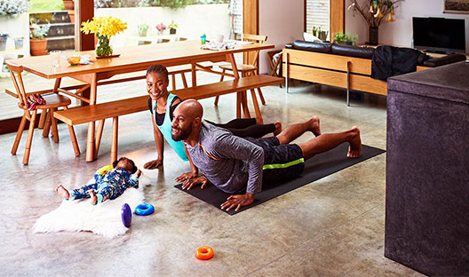 Couple working out at home