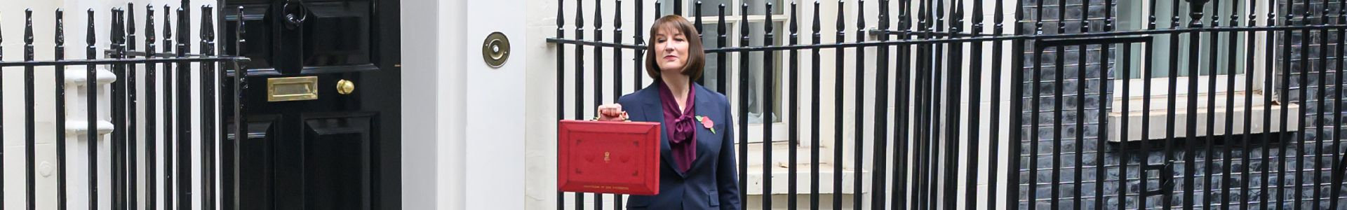 Rachel Reeves holds the Red Box aloft outside Number 11 before the Autumn Budget 2024