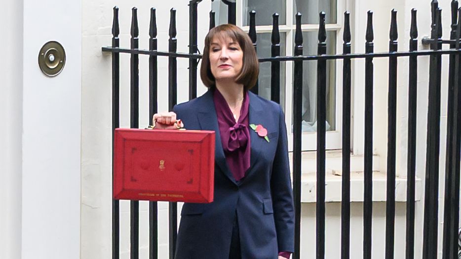 Rachel Reeves holds the Red Box aloft outside Number 11 before the Autumn Budget 2024