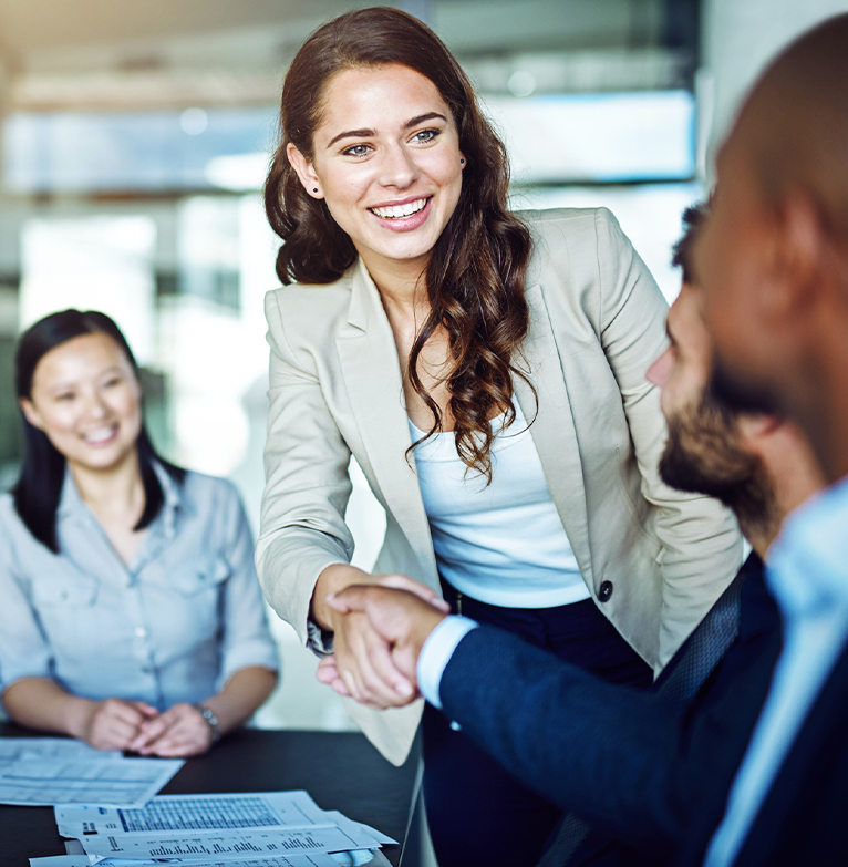 Different business people greeting each other