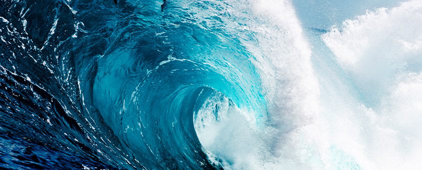 Large blue wave crashing